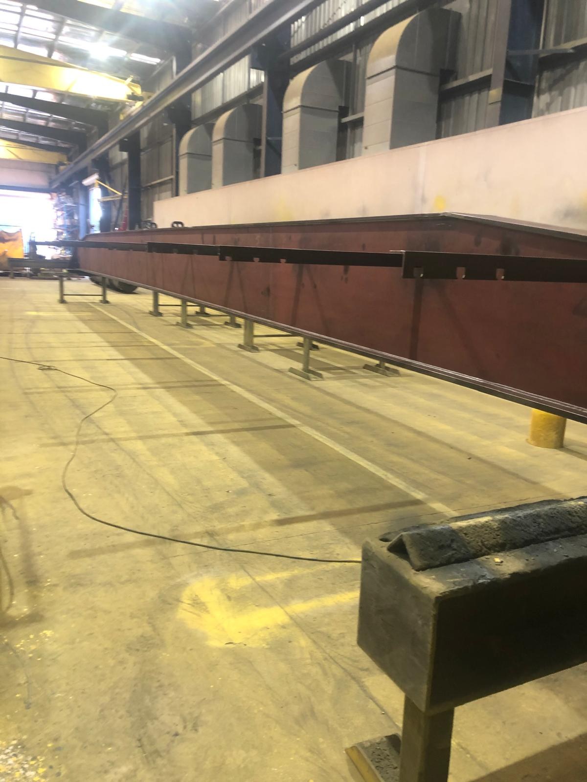 Long fabricated beam before coating