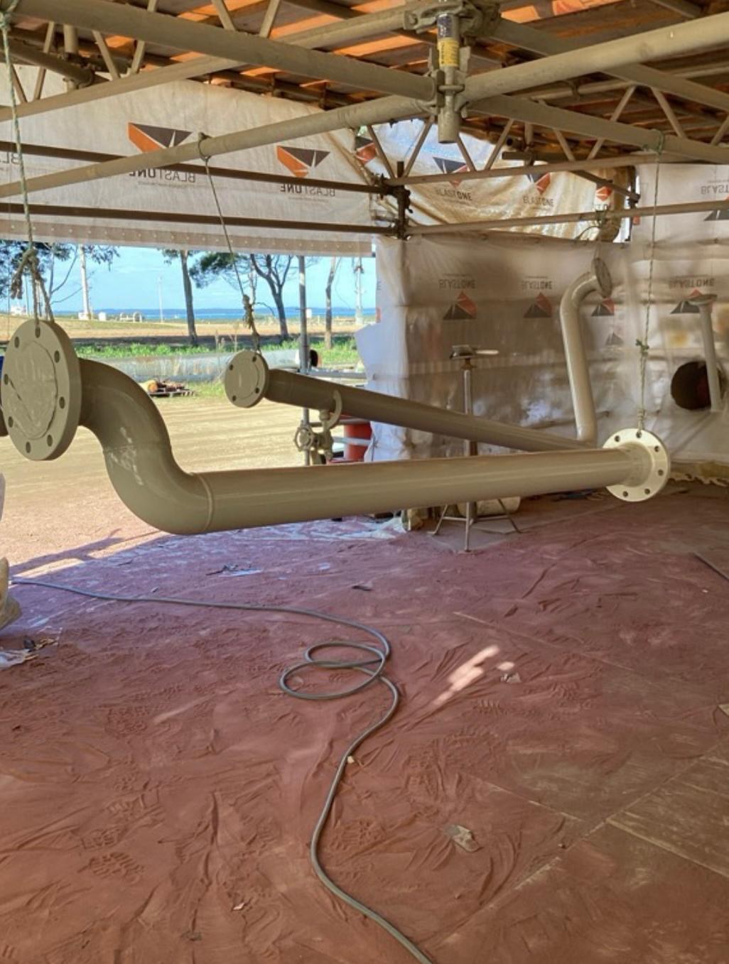 Industrial pipe spool coating
