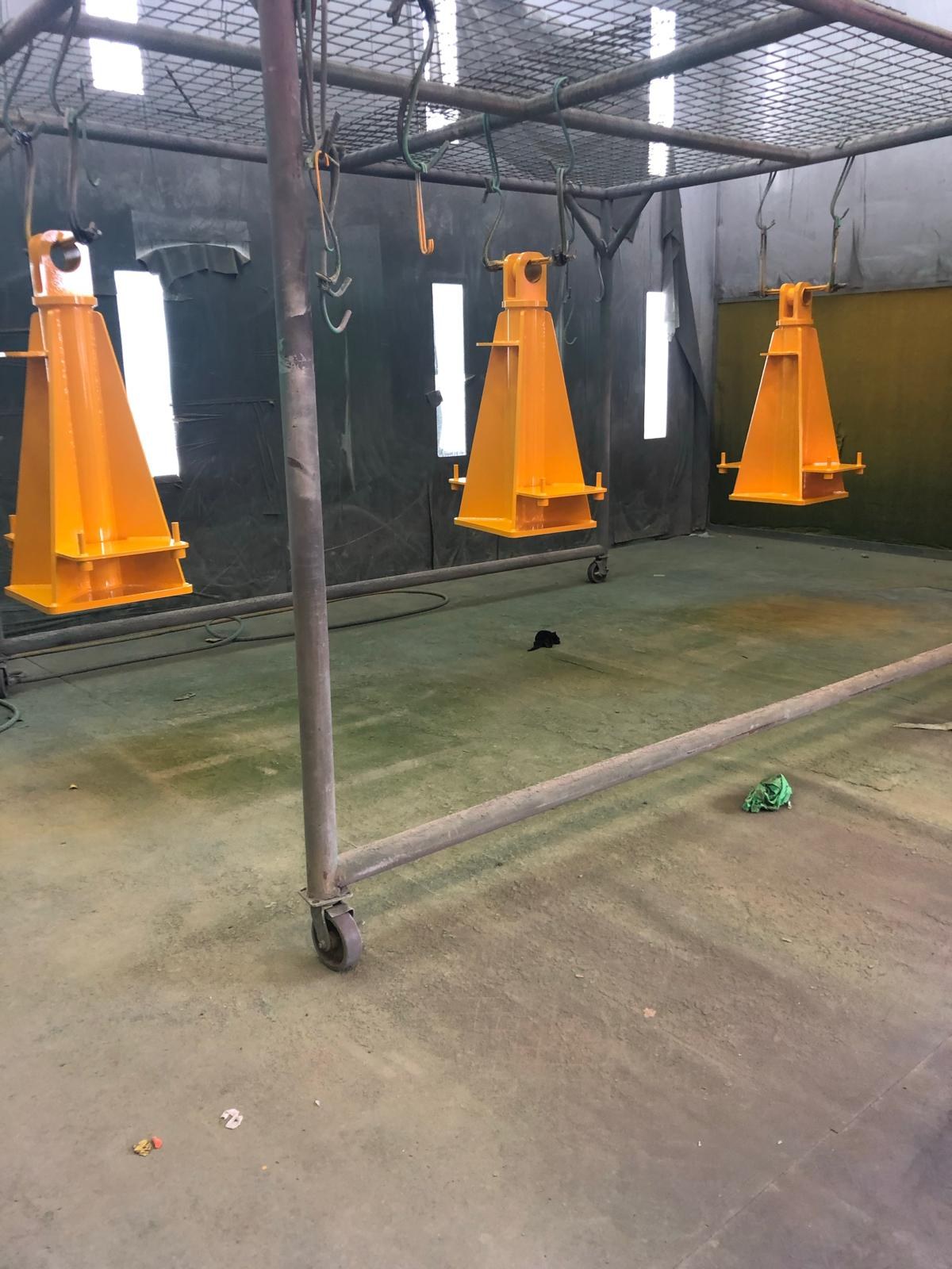 Fabricated supports after workshop spray painting